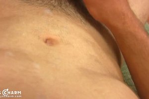 Muscled young boy with hairy bush is enthusiastically jerking off