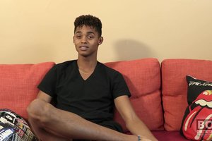 Cheerful athletic ebony guy is showing off his tasty body