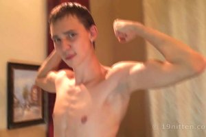 Athletic young dude wants you to look at him posing and masturbating
