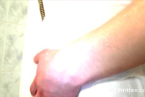 Hunk dude is soaping up his butt and penetrating his tight chocolate hole