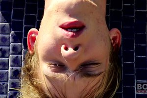 Perverted young guy is wanking his lustful cock in a swimming pool