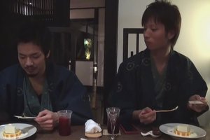 Two rough asian dudes are coming out of the closet and making out