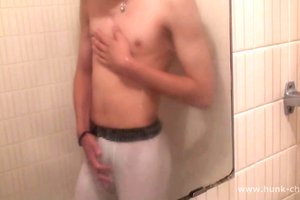 Young and naive asian boy is touching himself under the shower