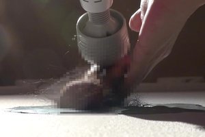 Slutty guy is sticking his naughty junk in a glory hole and getting it vibrated