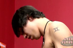 Seductive nerd in glasses and bow tie is getting his erected penis sucked