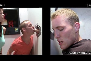 Athletic guy is opening his mouth and pressing it to the glory hole