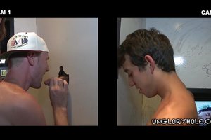 Handsome muscular guy is licking a fat cock of a stranger through glory hole