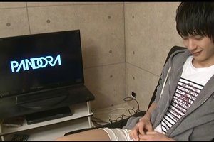 Curious asian guy is watching nasty bdsm porn with hot guys